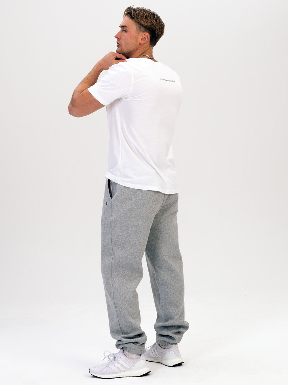 man wearing grey organic cotton sweatpants