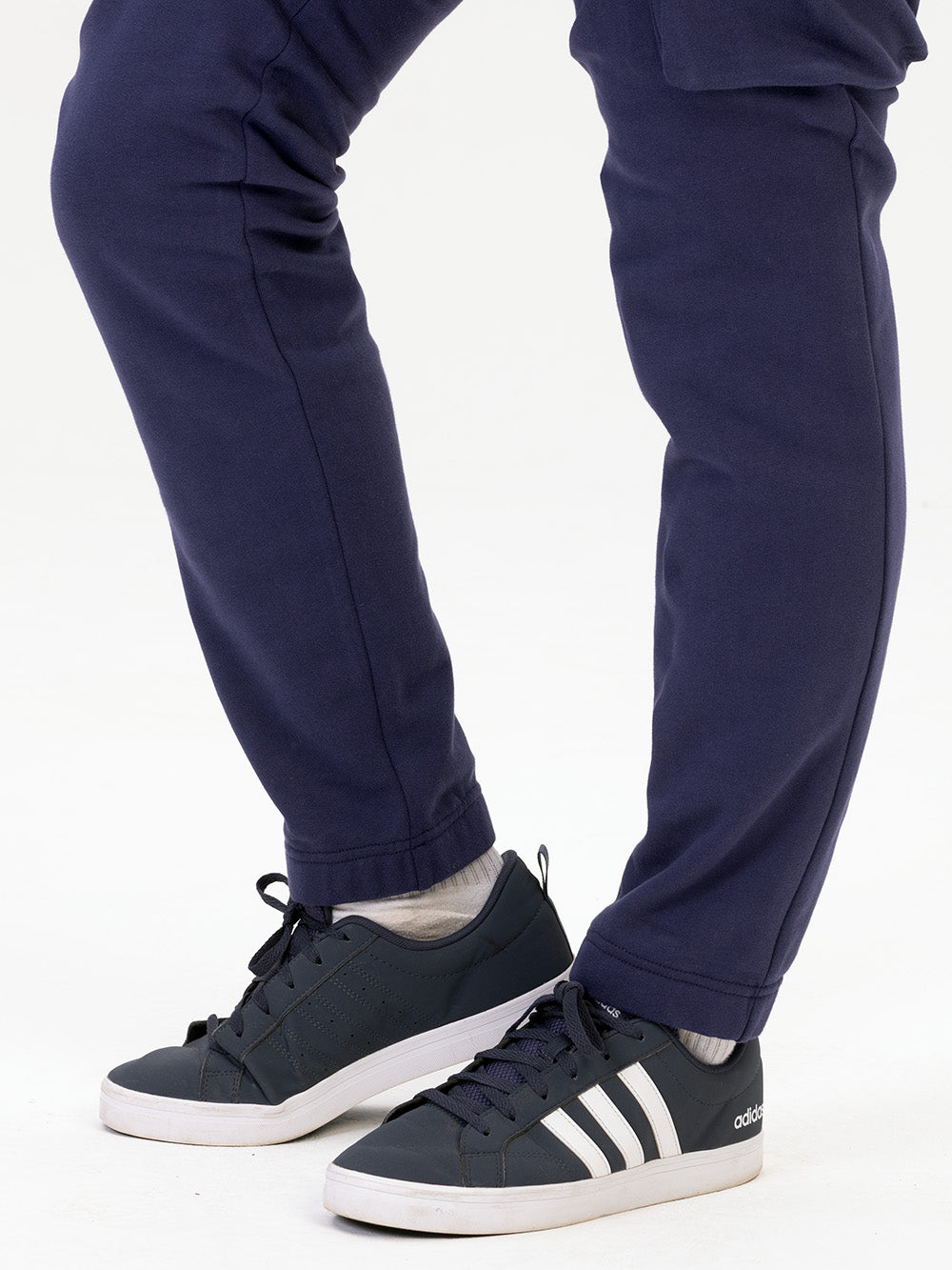 navy cargo joggers and trainers