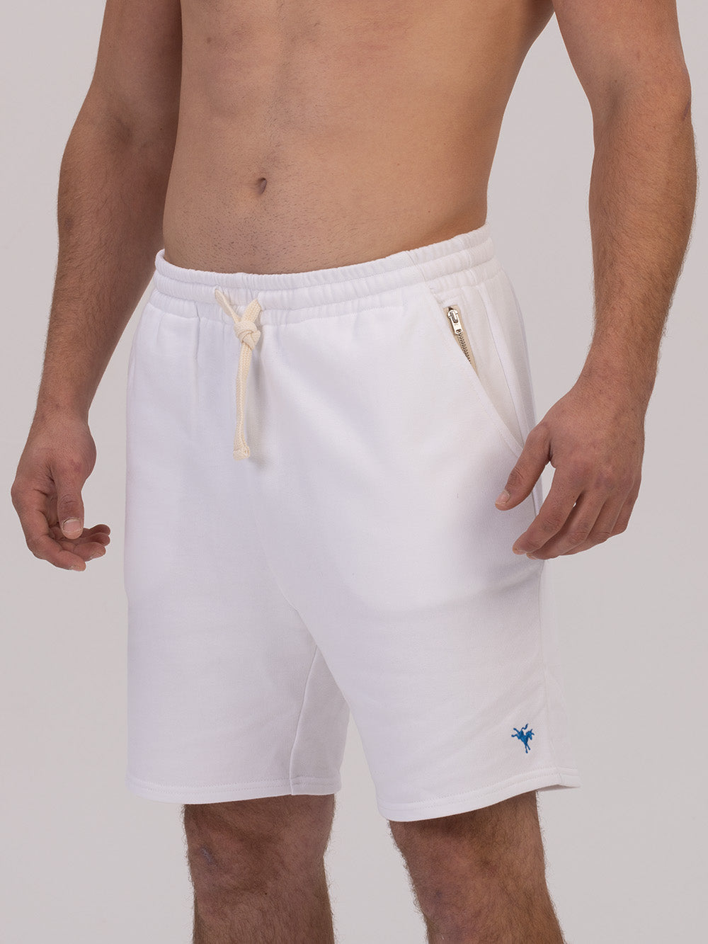 man wearing white French terry gym shorts